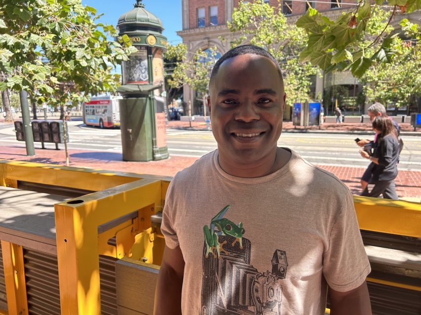 A man wearing a t - shirt.