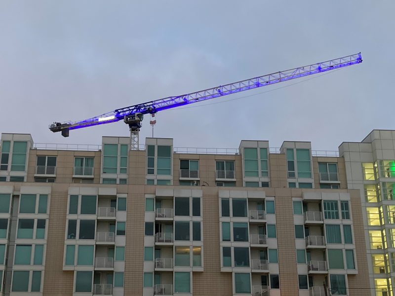 A blue construction crane at Brannan Street.
