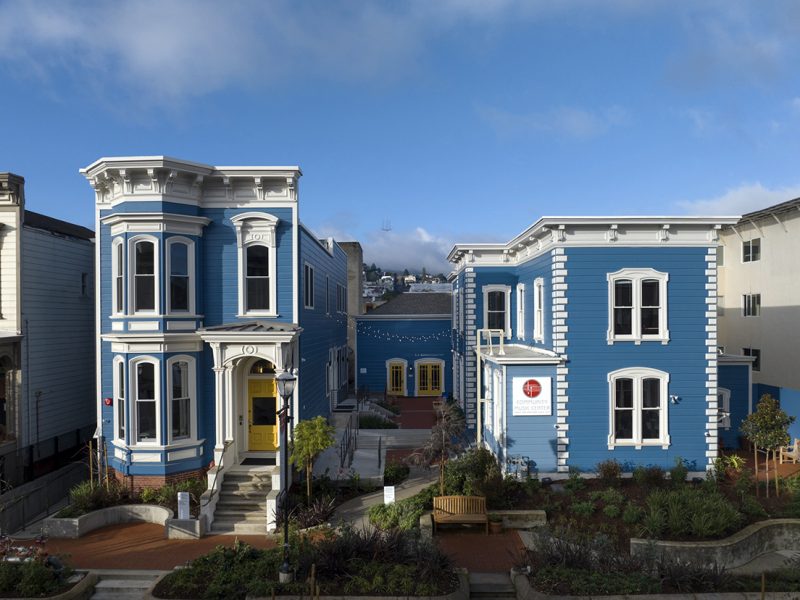The Community Music Center's blue buildings on Capp Street in san francisco.