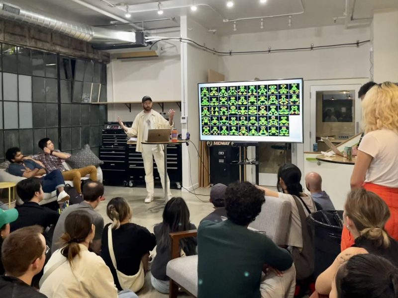 A group of people observing an AI-related presentation in a room during the AI boom.