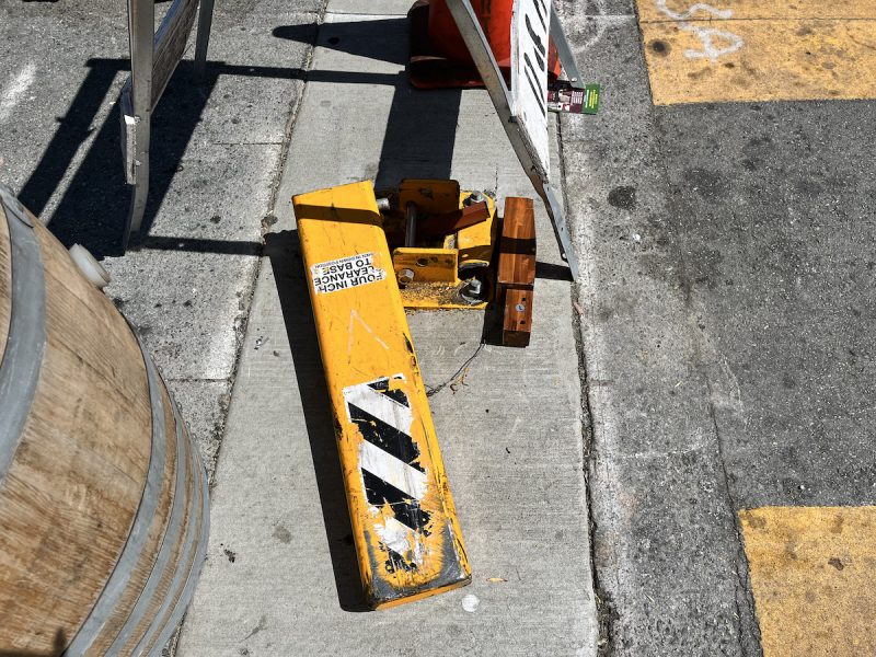 a bollard lies flat on the ground