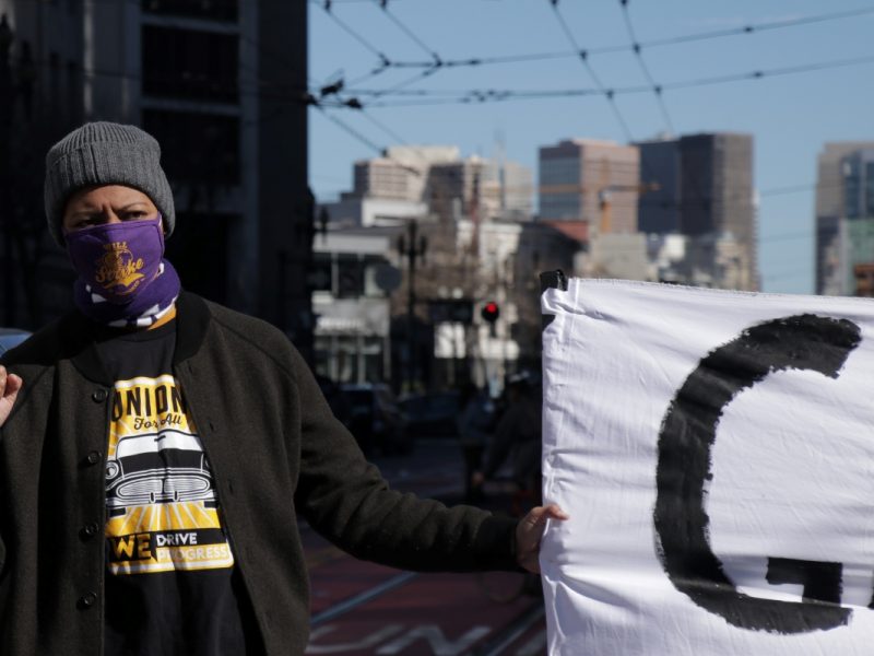 Jennifer Esteen and other members of SEIU 1021 temporarily shut down a section of Market Street on Feb. 17, 2021 to advocate for paid personal protective equipment for gig drivers. Photo by Juan Carlos Lara