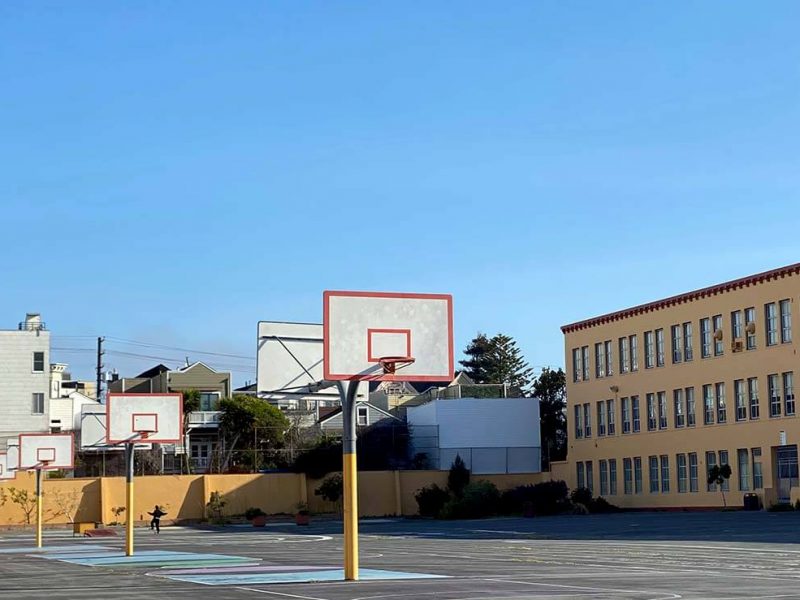 Practicing Tai Chi on the basketball courts at Everett