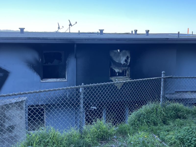 blackened and burnt windows in Potrero Hill public housing