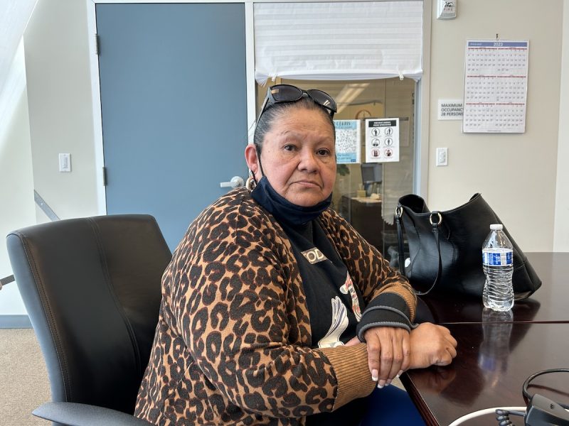 A profile of a woman in a cheetah-print sweater. Martha Gutierrez faces eviction.