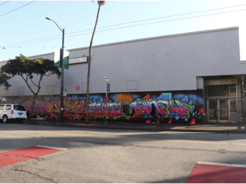 A vacant Walgreens building with graffiti on it may become affordable housing.